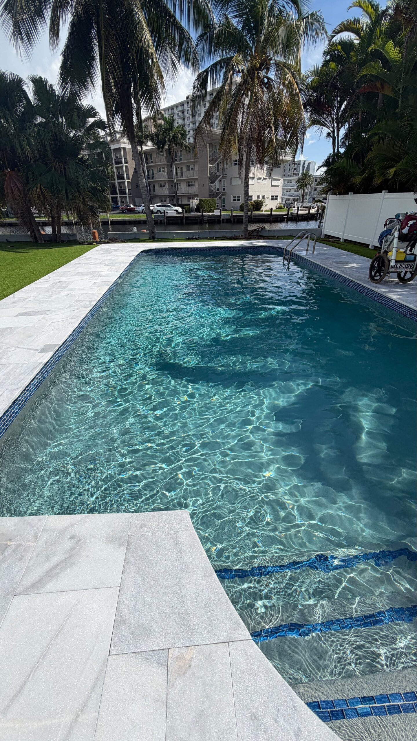 Clean residential swimming pool maintained by Poolside Luxe